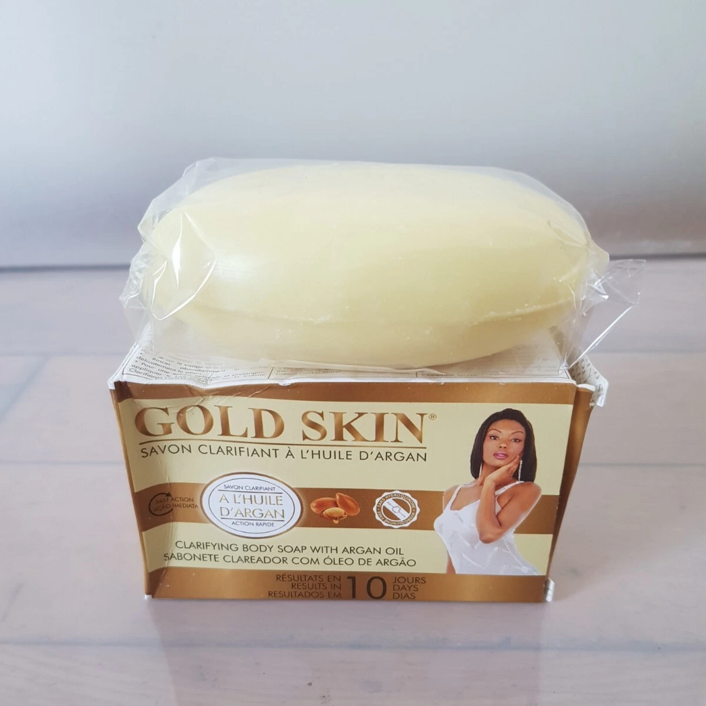 Gold Skin soap bar with packaging on a white background